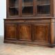 Large glass-fronted library in rosewood from the 19th century.