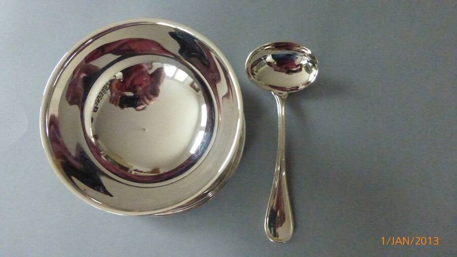 Sauce boat and serving spoon