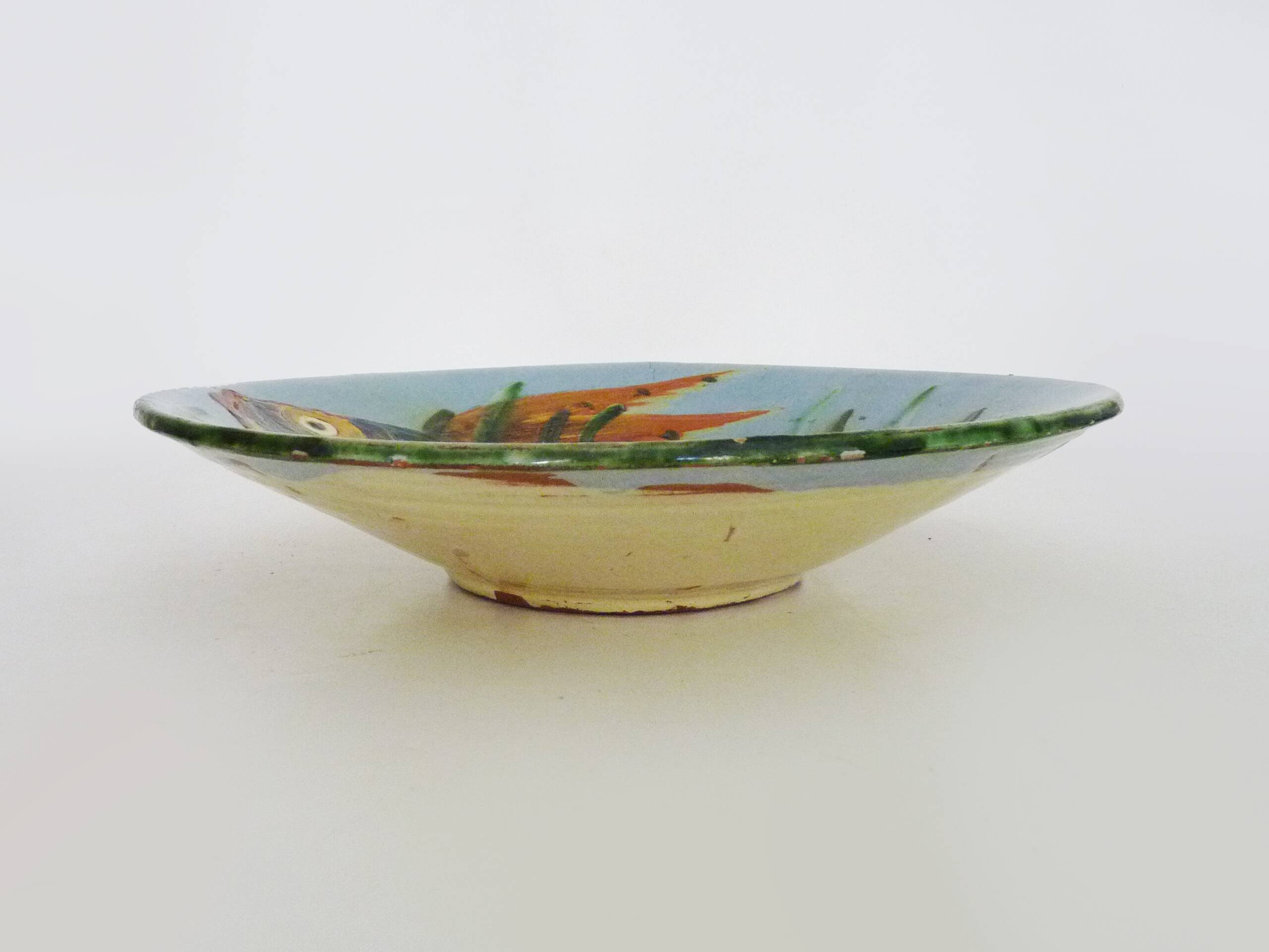 Decorative ceramic wall plate with fish decoration by Puigdemont.