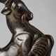 Art Deco bookends with patinated ibex in a taupe marble base.