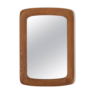 Mid-century modern sculptural wall mirror in stained oak, glass, Glas & Trä 1959