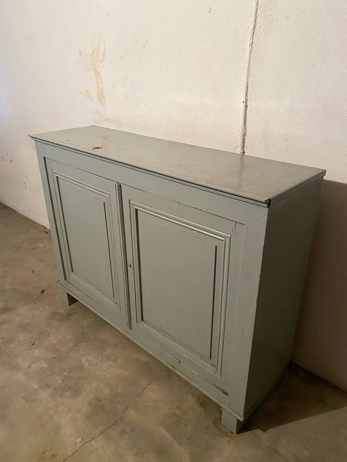 Antique vintage two-door sideboard in cloud gray