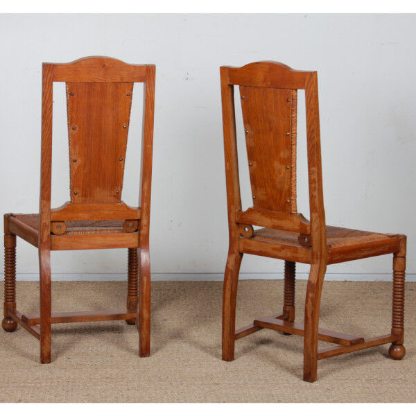 Suite de 6 chaises dans le goût de Charles Dudouyt, 1950
