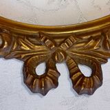Oval frame with gilded pediments 19th wood and stucco