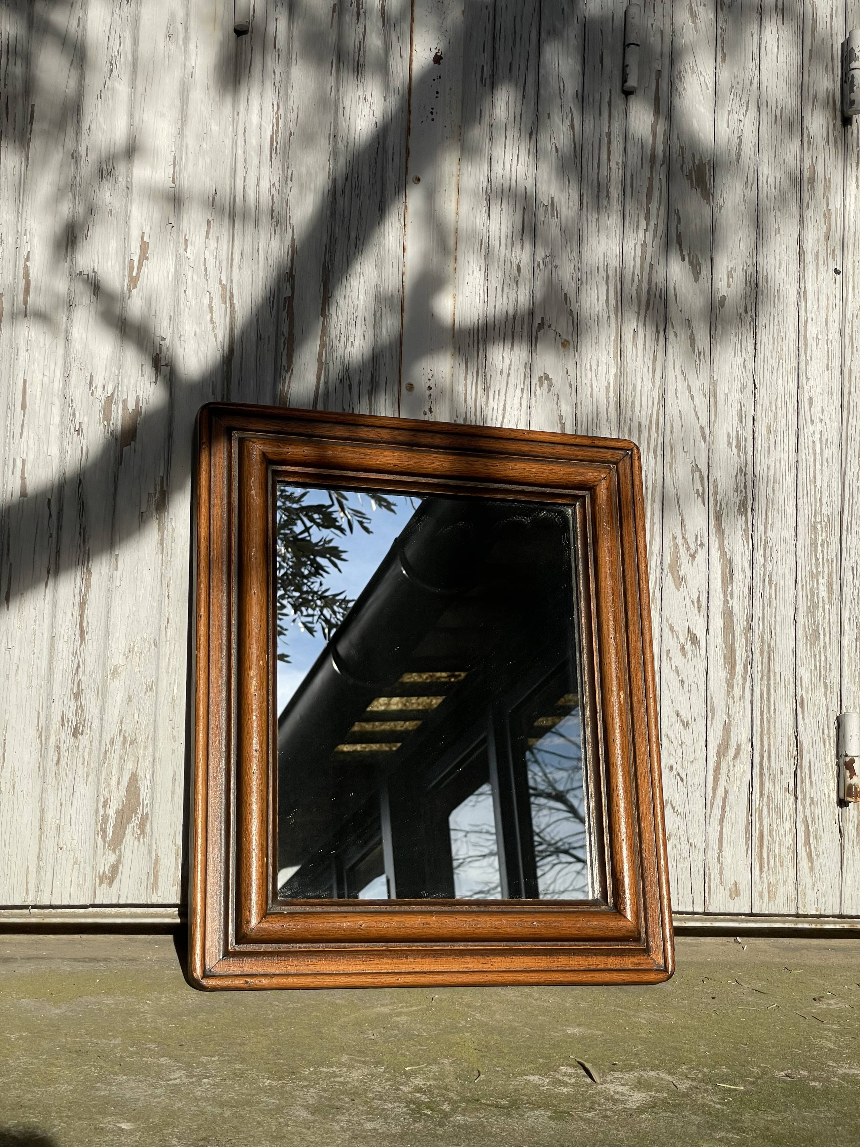 Antique wooden wall mirror