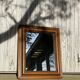 Antique wooden wall mirror