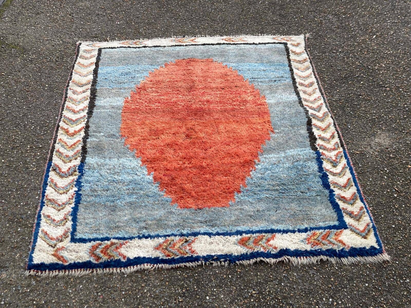 Handmade wool Berber rug with long pile, 110x150cm.