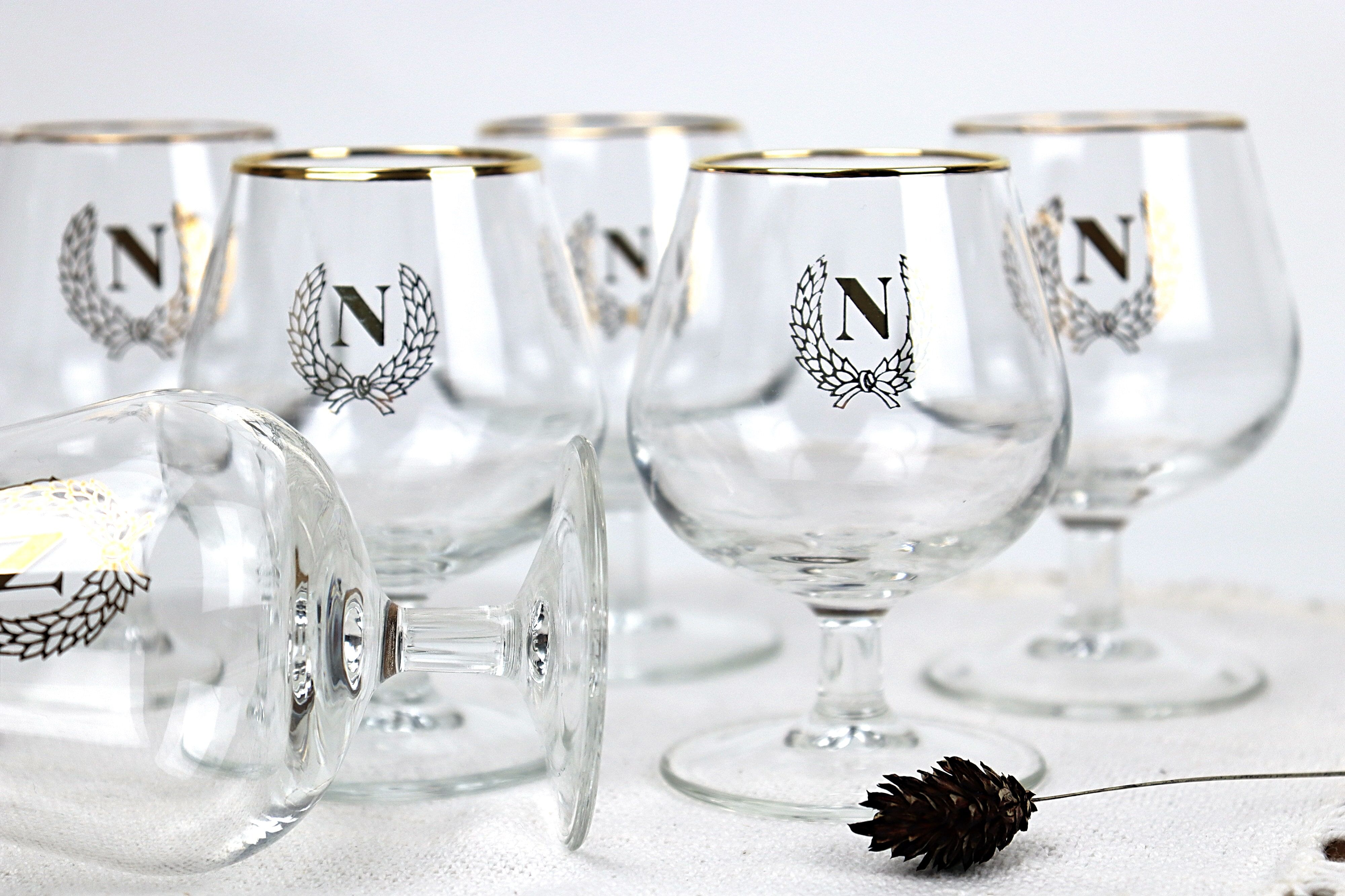 6 glasses with digestive "N"