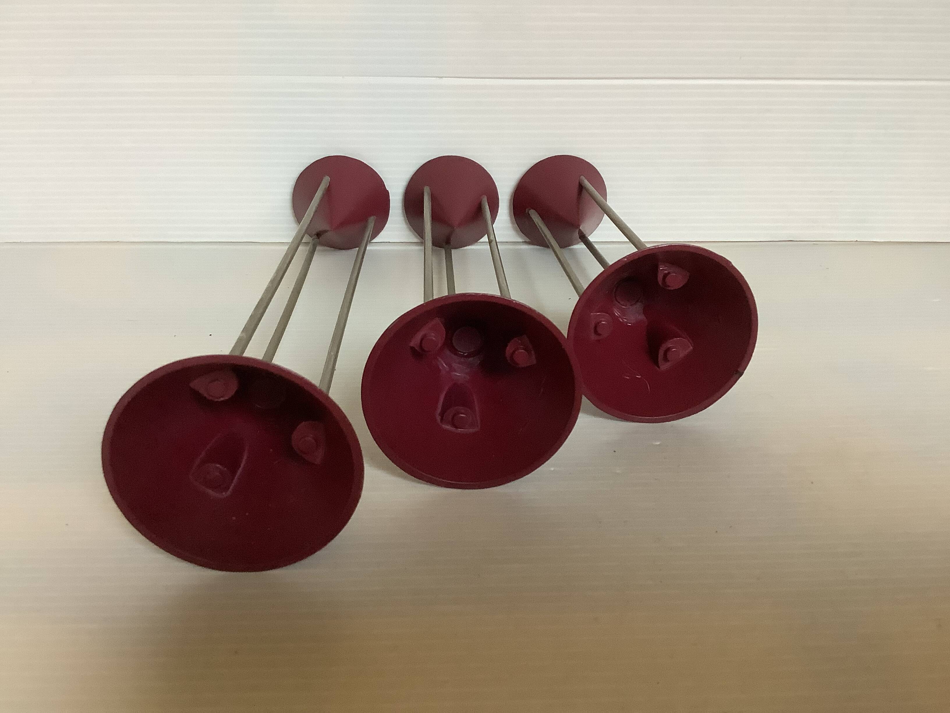 Trio of vintage burgundy candlesticks