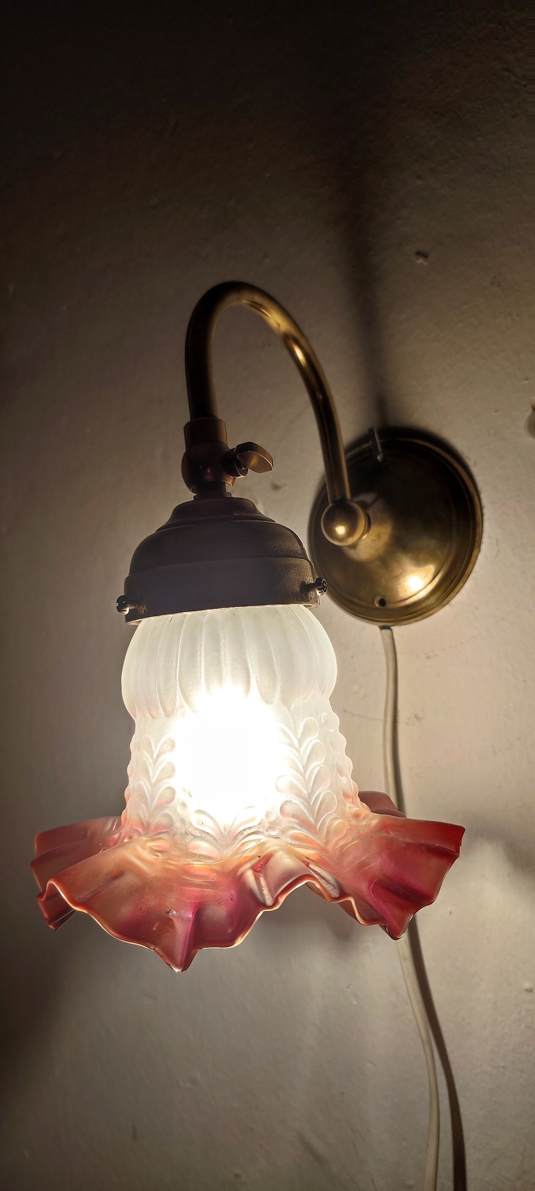 Bronze and glass wall lamp. Spain, 1940s.