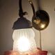 Bronze and glass wall lamp. Spain, 1940s.