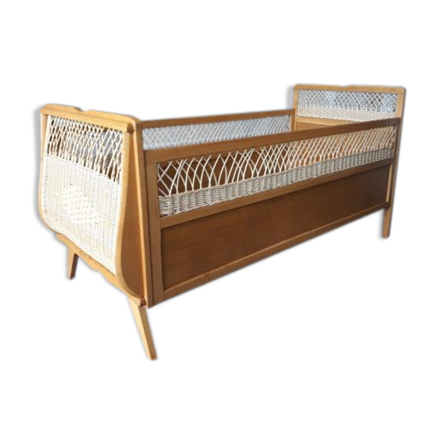 Wooden baby bed and vintage rattan