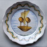 Plate XVIII ° scalloped with flying machine pattern