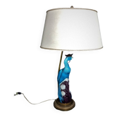 Large table lamp with earthenware peacock and beige silk lampshade