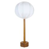 Mid-century solid teak table lamp from the 1960s Sweden.