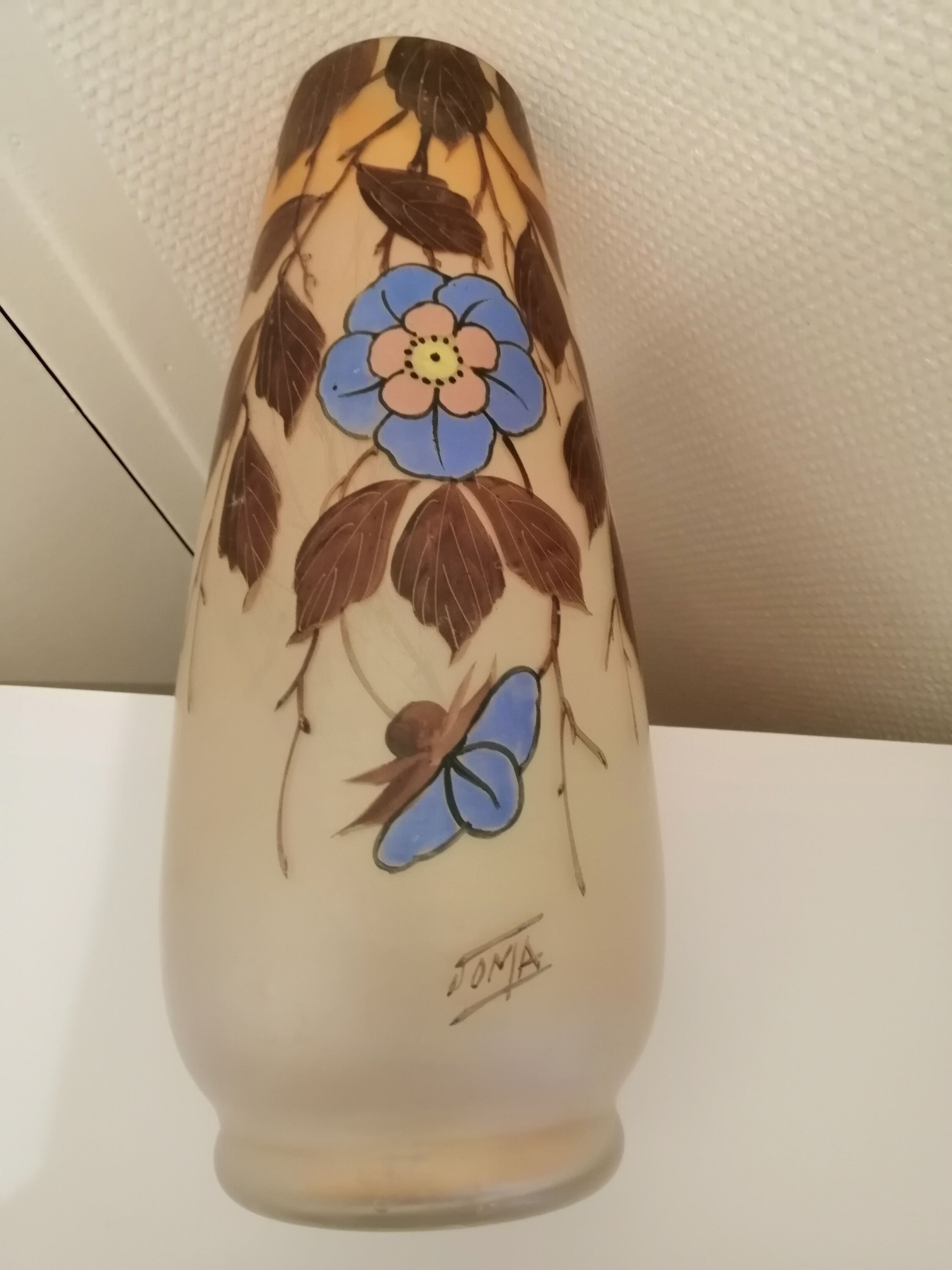 Old vase in colored glass