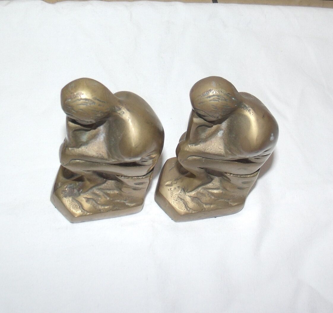 Pair of greenhouses books bronze the thinker by Rodin