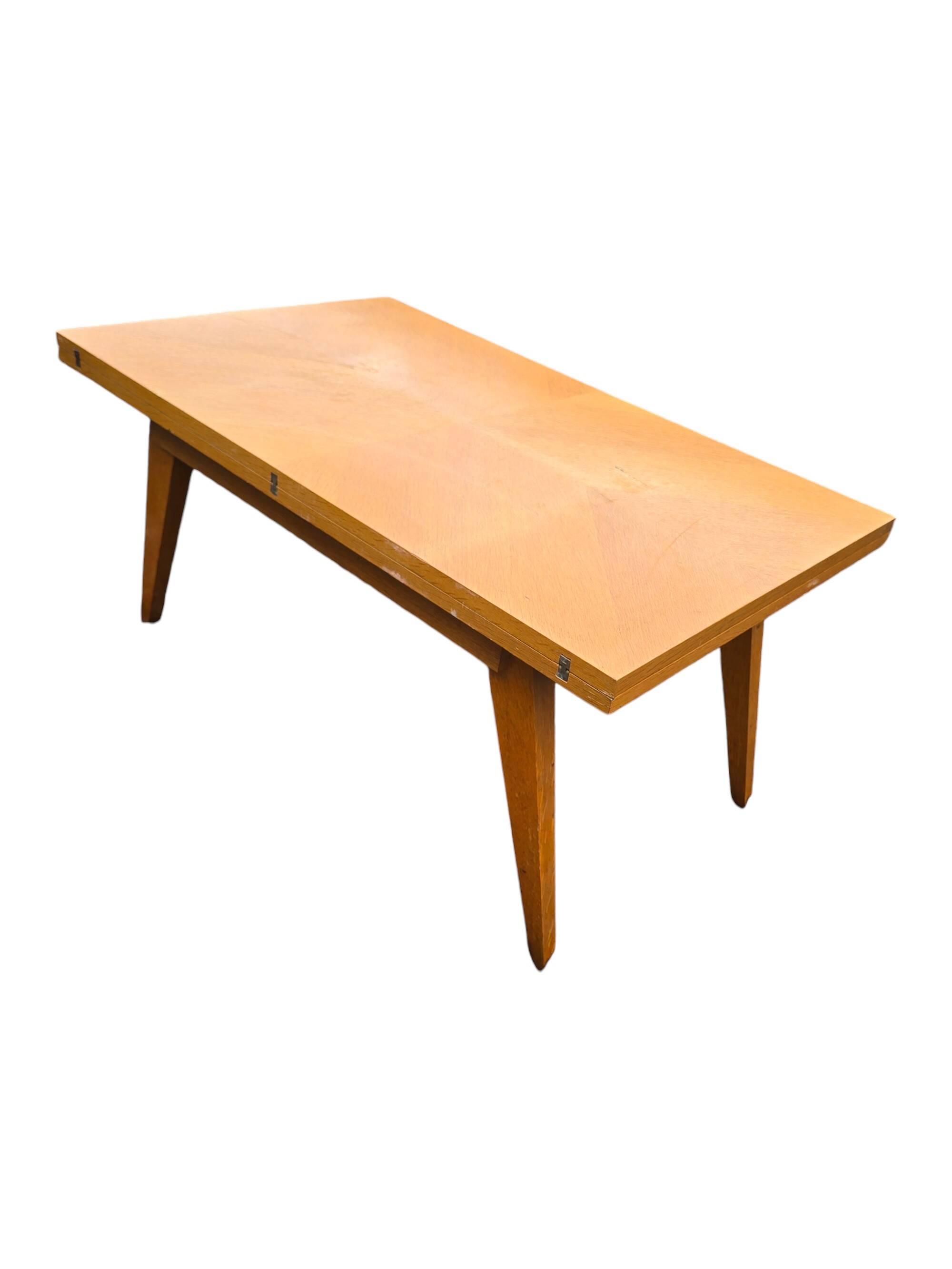 Scandinavian 1960s transformable coffee table in light wood.