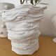 Cache pot blanchi