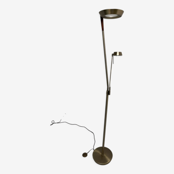 Golden metal floor lamp with reading light