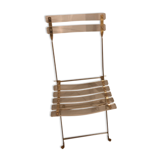 Chaise pliante en plexiglass et laiton
