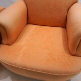 Deep seated armchair in the style of Howard & Sons