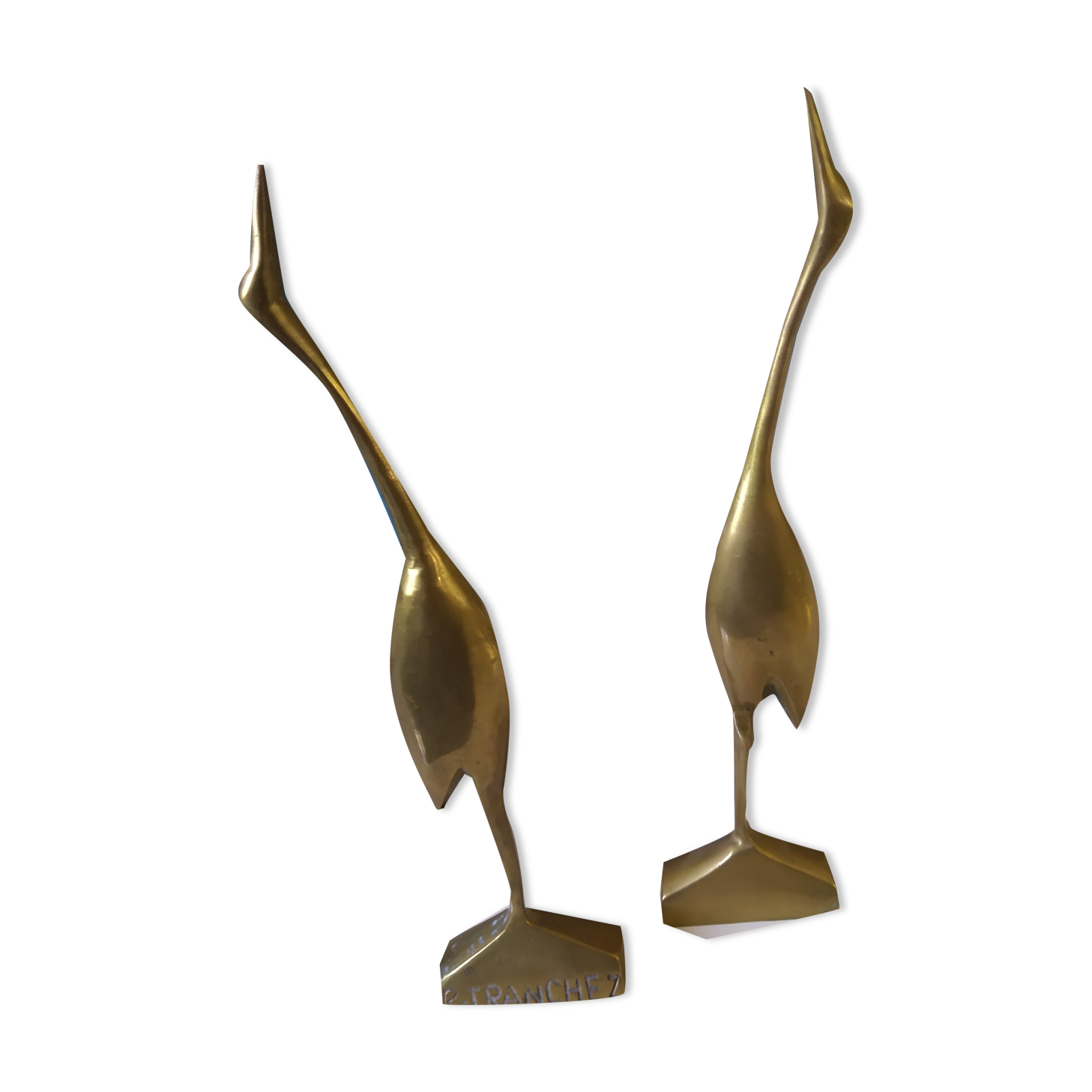 Coupled with brass herons