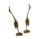 Coupled with brass herons