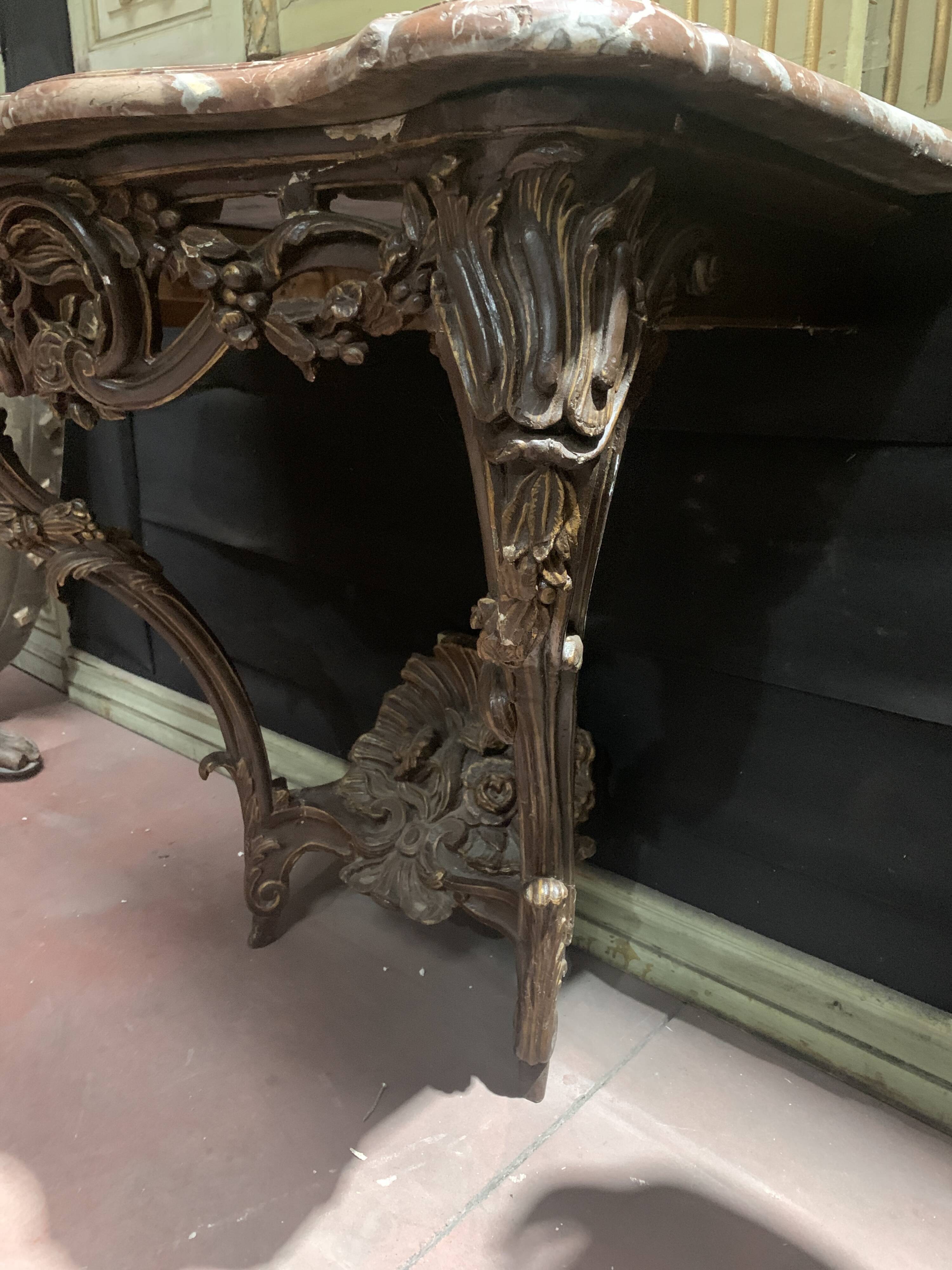 Louis XV console in carved and patinated wood, 18th century period