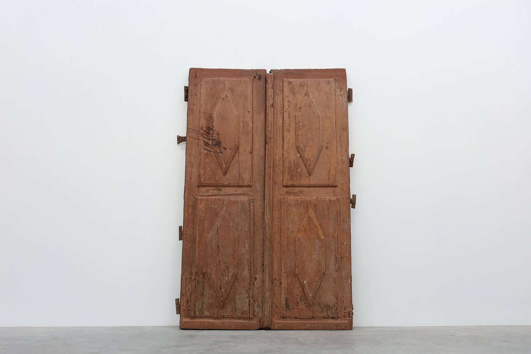 Large 17th century Monastery doors in terracotta lacquered oak, Portugal