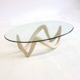 Oval coffee table with sculptural base by Armando Rosato