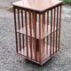 Art Deco style revolving bookcase in walnut and oak