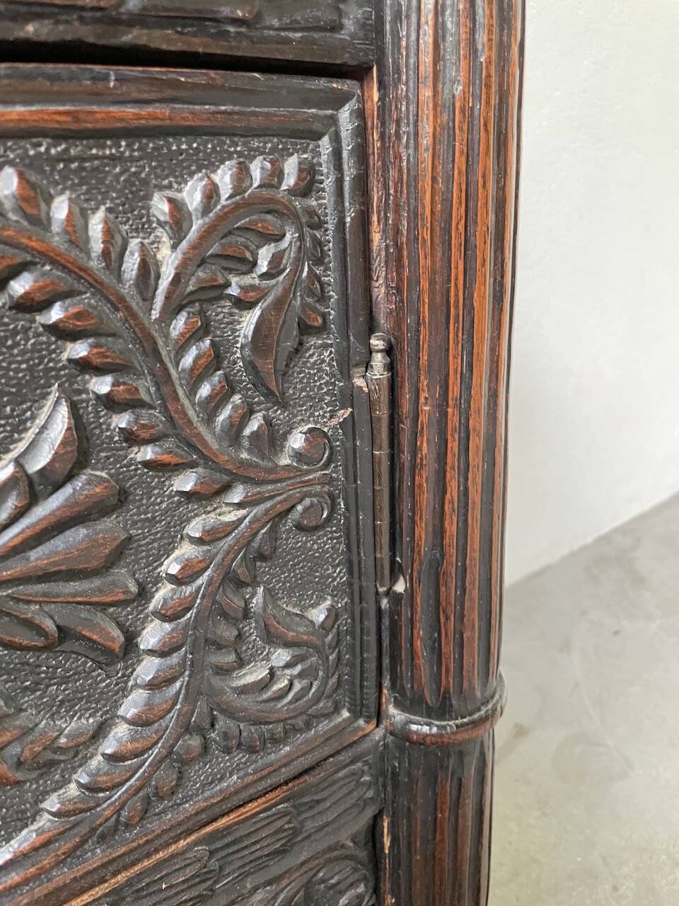 19th century chest of drawers in carved blackened pine