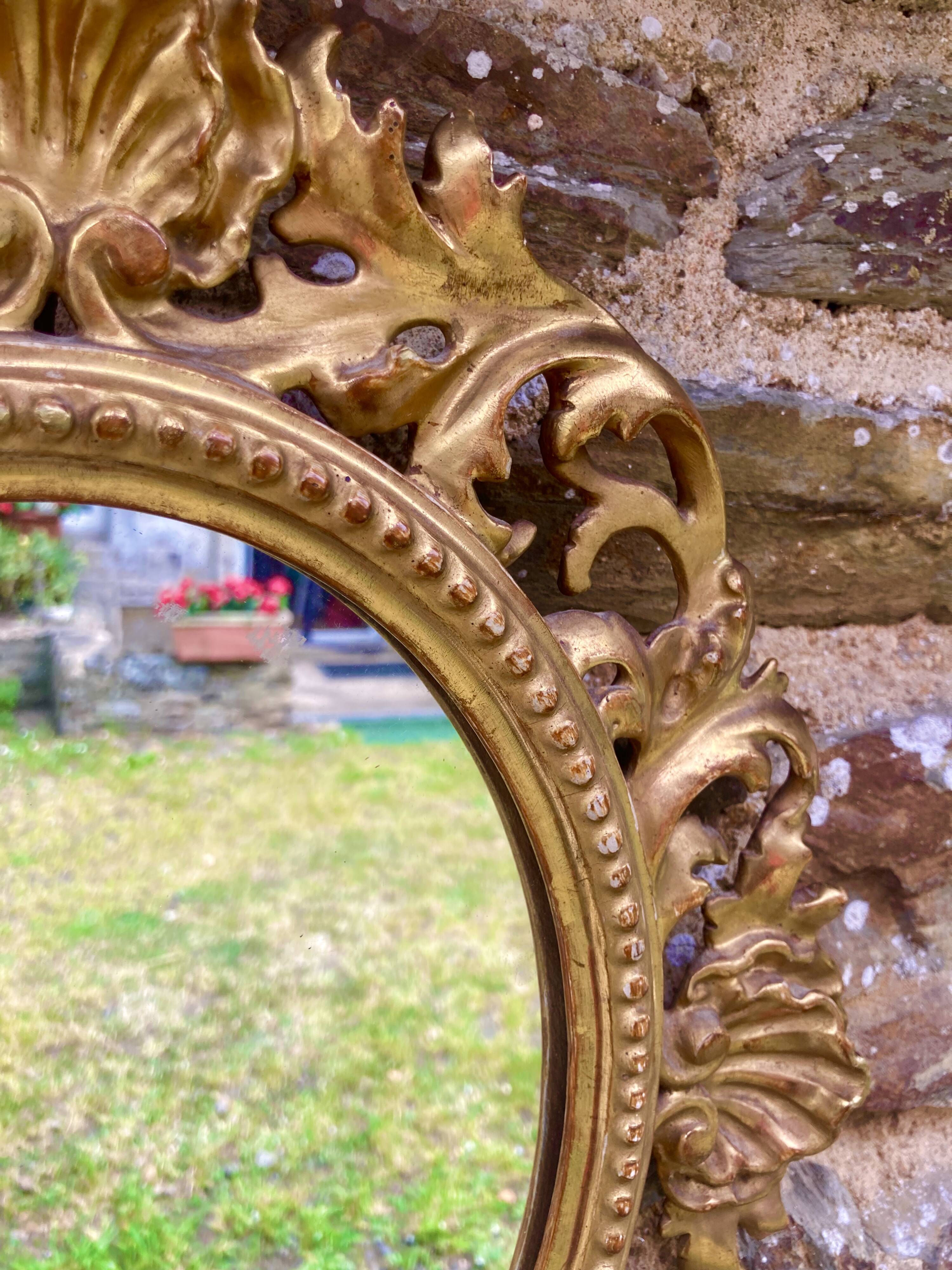 Mirror in carved wood gilded with leaf, Louis XV period, 18th century
