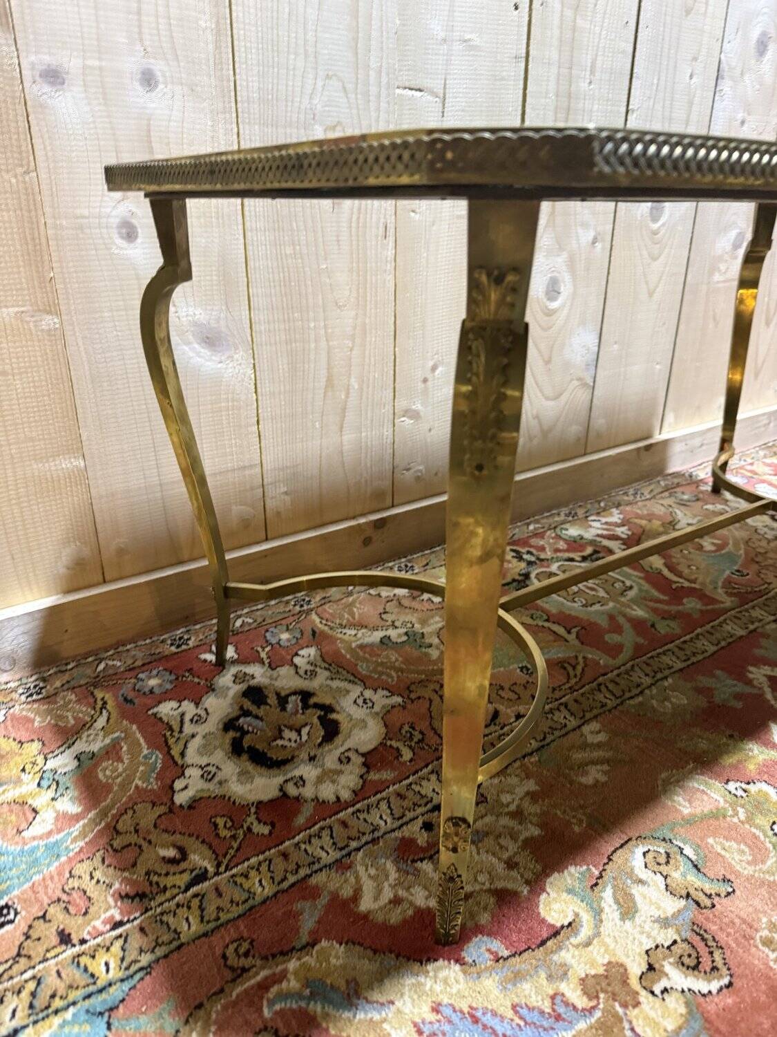 Neoclassical style coffee table with glass