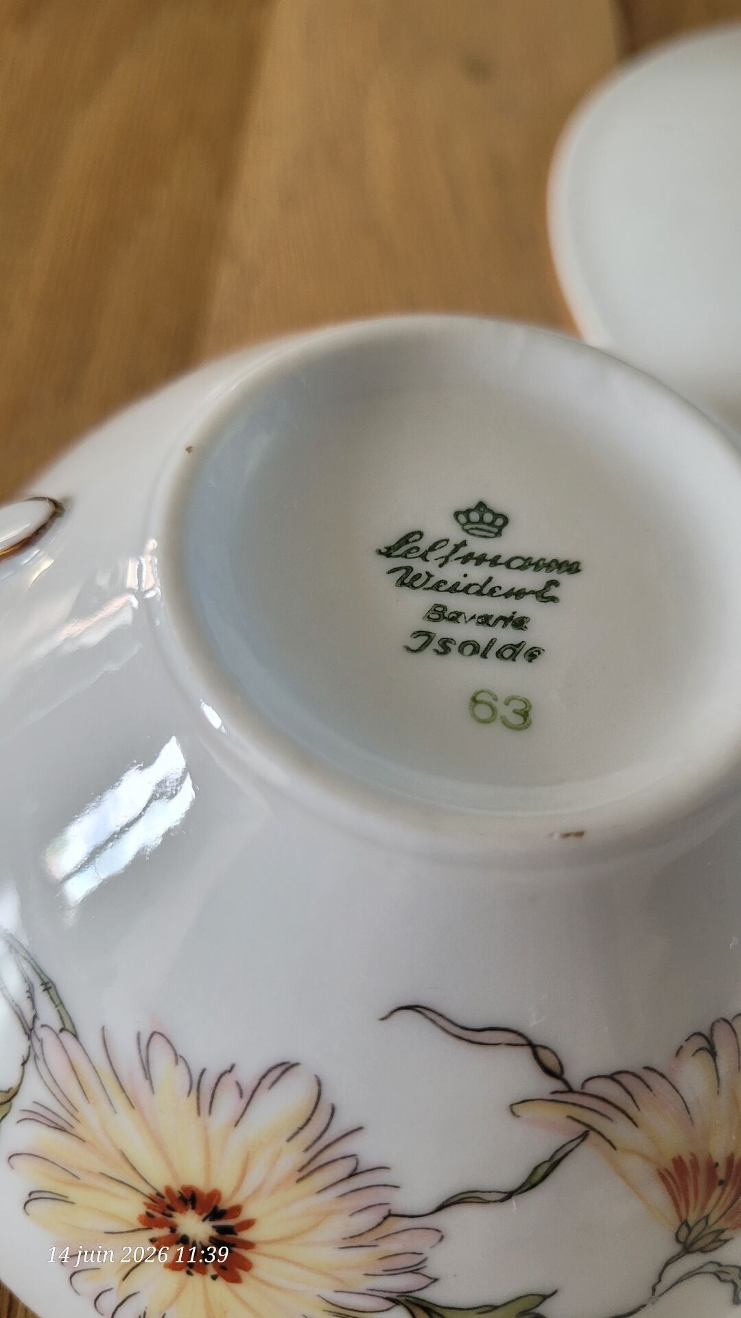 2 large antique cups and their saucers