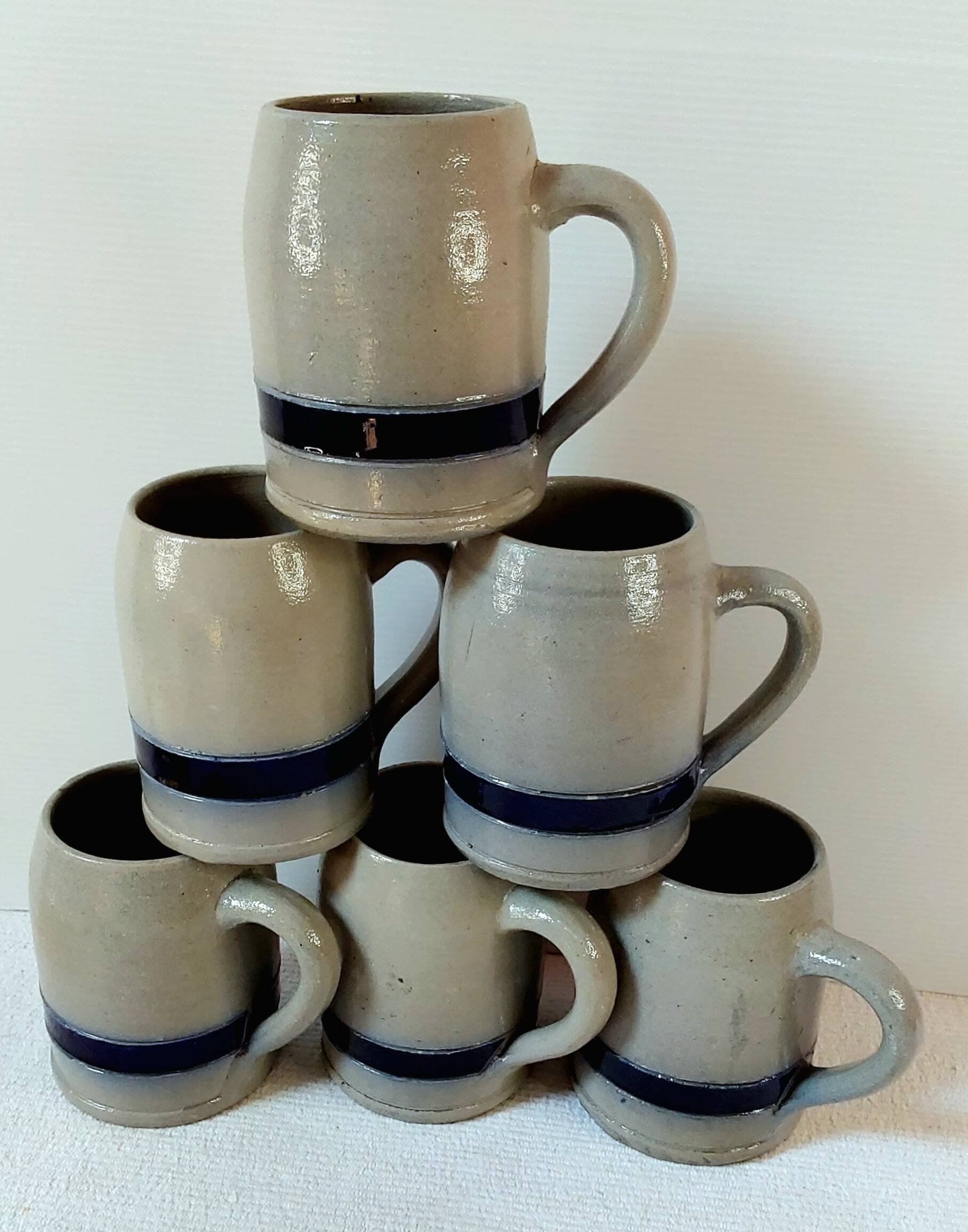 Six real sandstone mugs