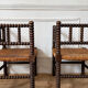 Pair of rush-seated chairs by the fireside "bobbin"