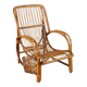Vintage wicker armchair with magazine rack, Italy, 1960s