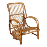Vintage wicker armchair with magazine rack, Italy, 1960s