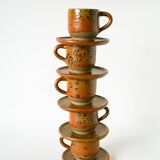 Glazed stoneware coffee service consisting of a coffee pot and 5 cups.