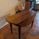 Round table with hinged doors