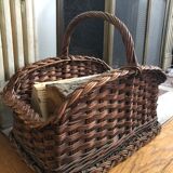 Log basket near fireplace