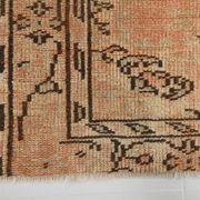 Tapis vintage rose poudré fait main en laine, style oriental doux