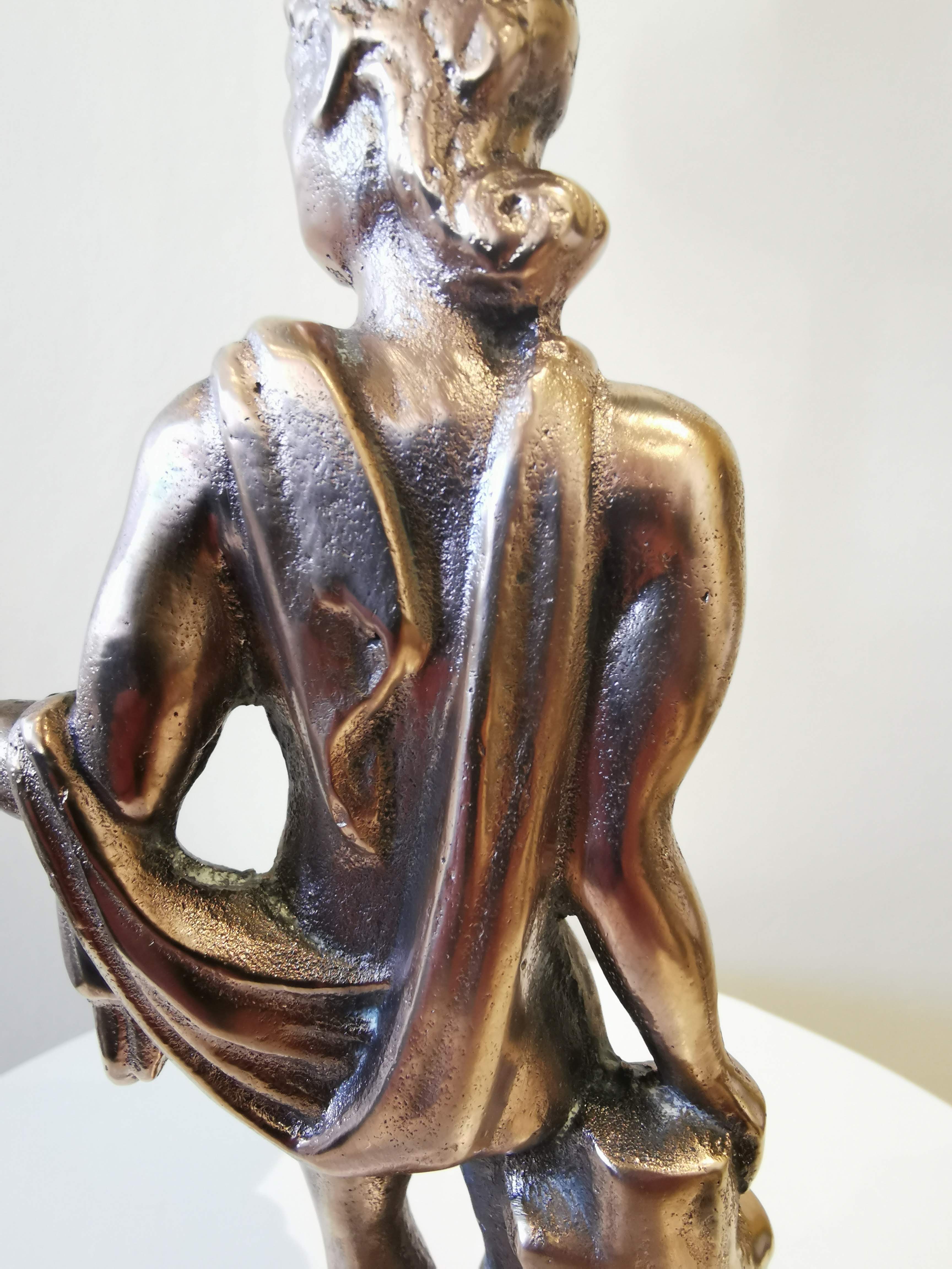 Large kerosene lamp mounted on bronze statue. Late nineteenth century