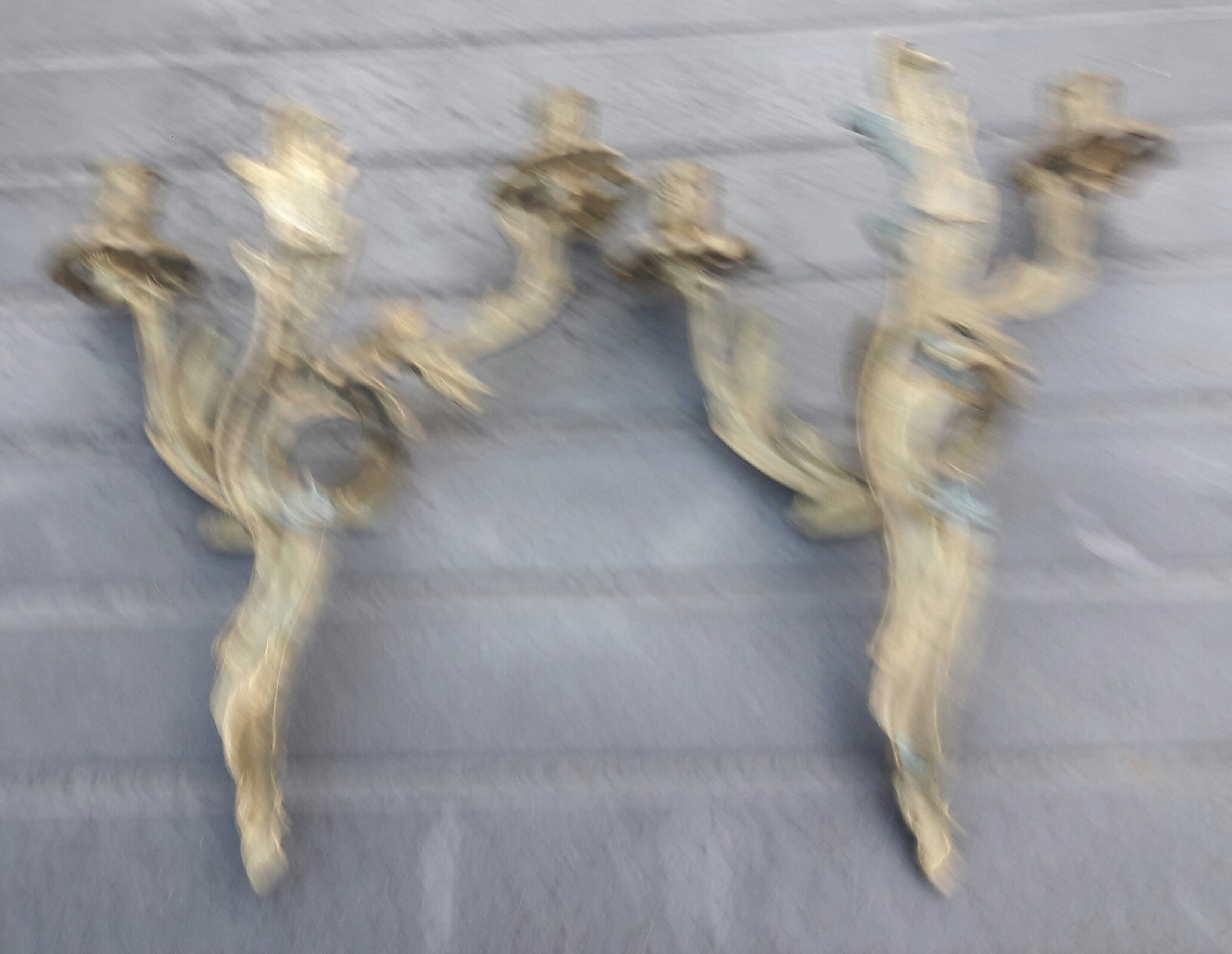 Pair of Louis XV style bronze sconces