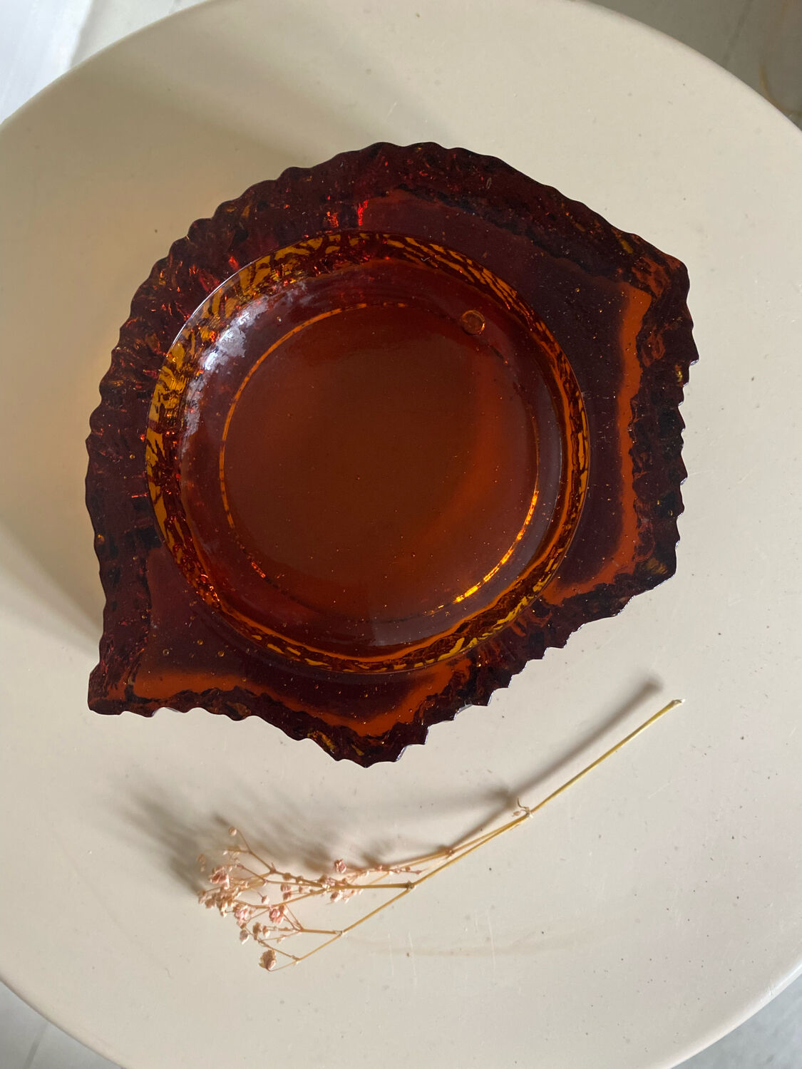 Ashtray in amber bubbled glass