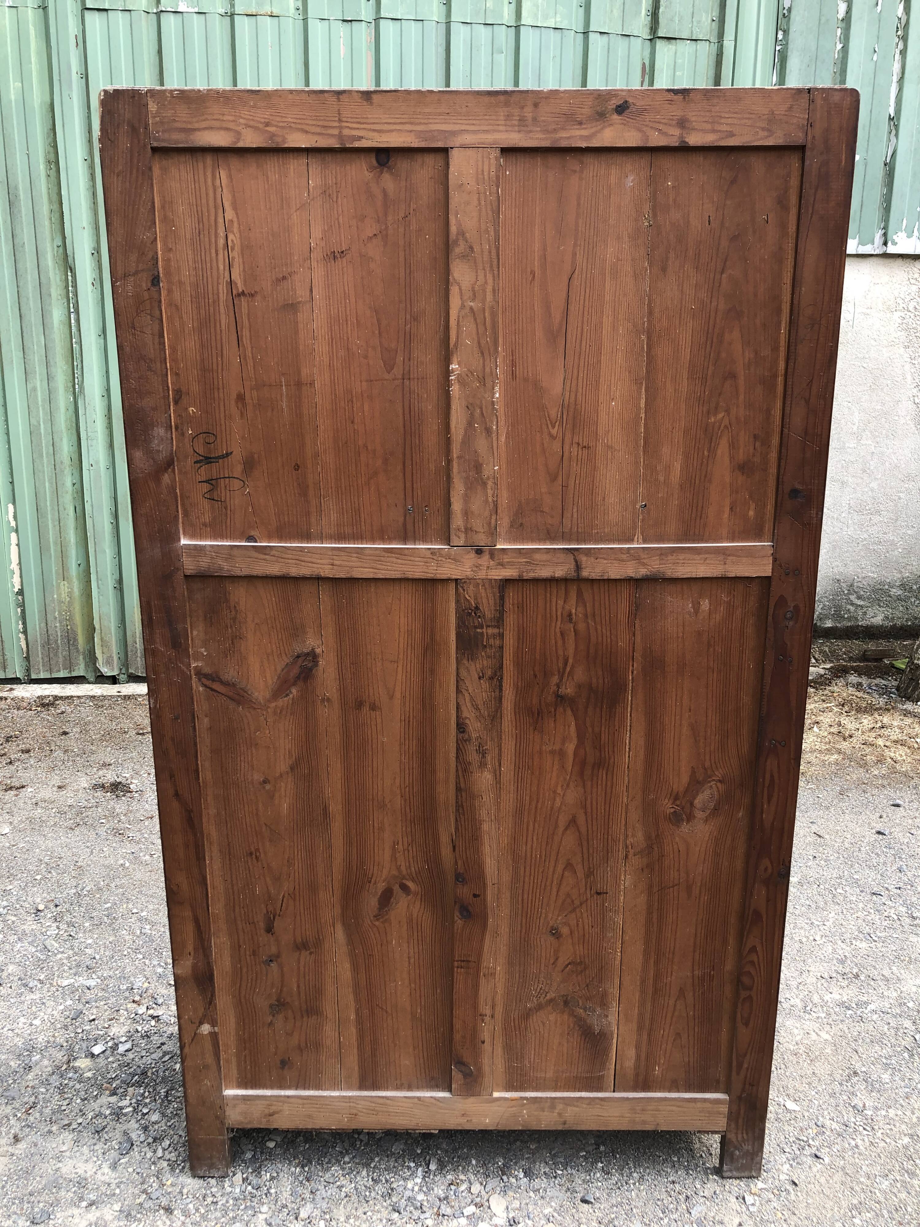 Vintage Parisian pine cabinet.