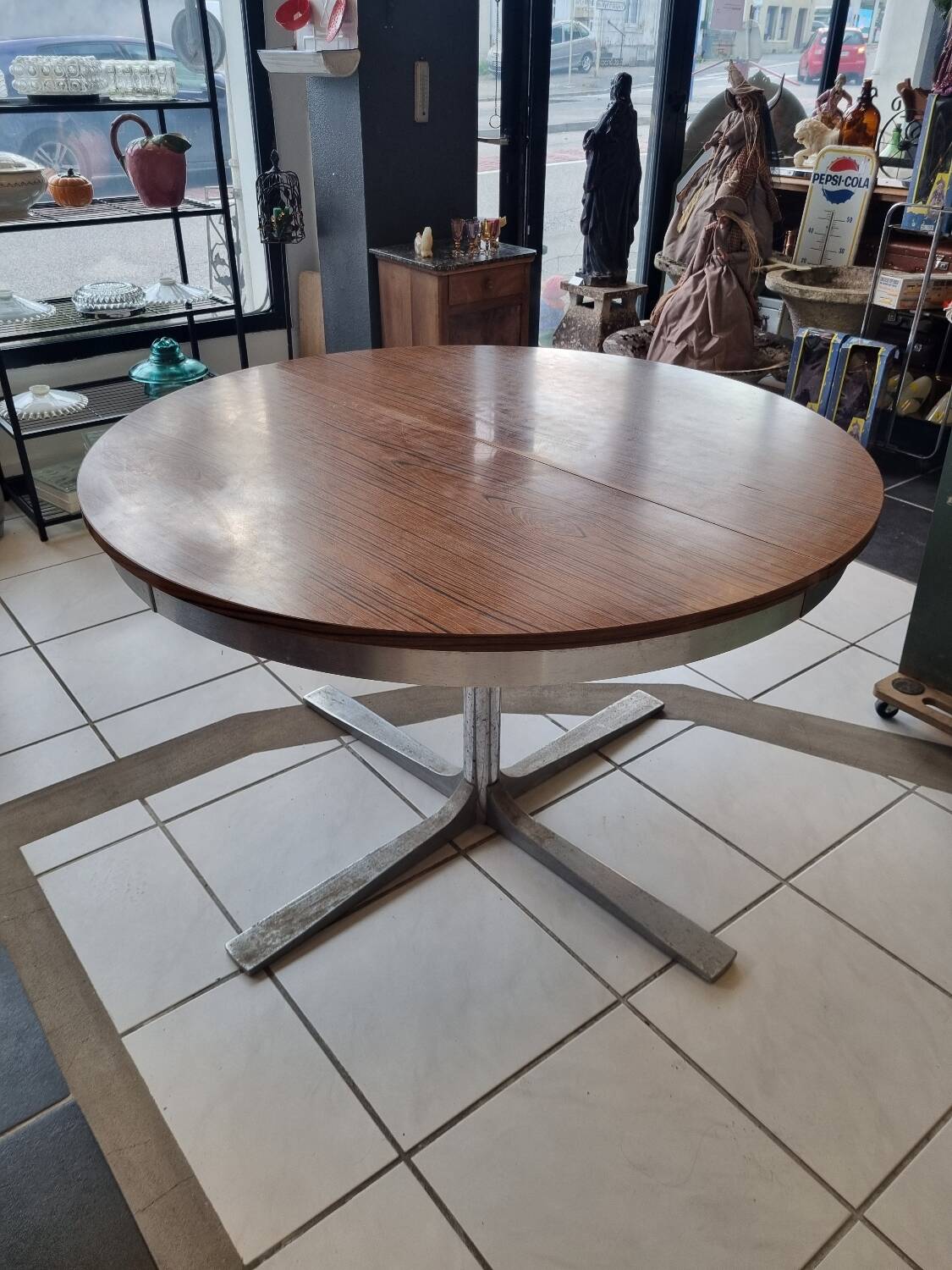 Vintage formica table with chrome leg and extension