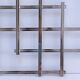 Art Deco style extendable silver metal trivet